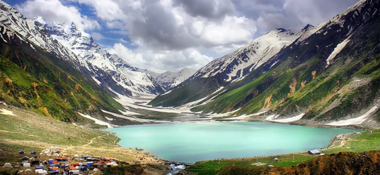 Lake Saiful Muluk with snow-capped mountains in Kaghan Valley, Mansehra